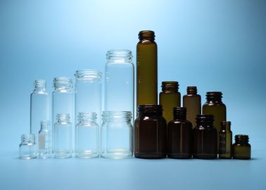 Ясность и янтарная фармацевтическая или косметикой продетая нитку верхняя пробирка стеклянной бутылки